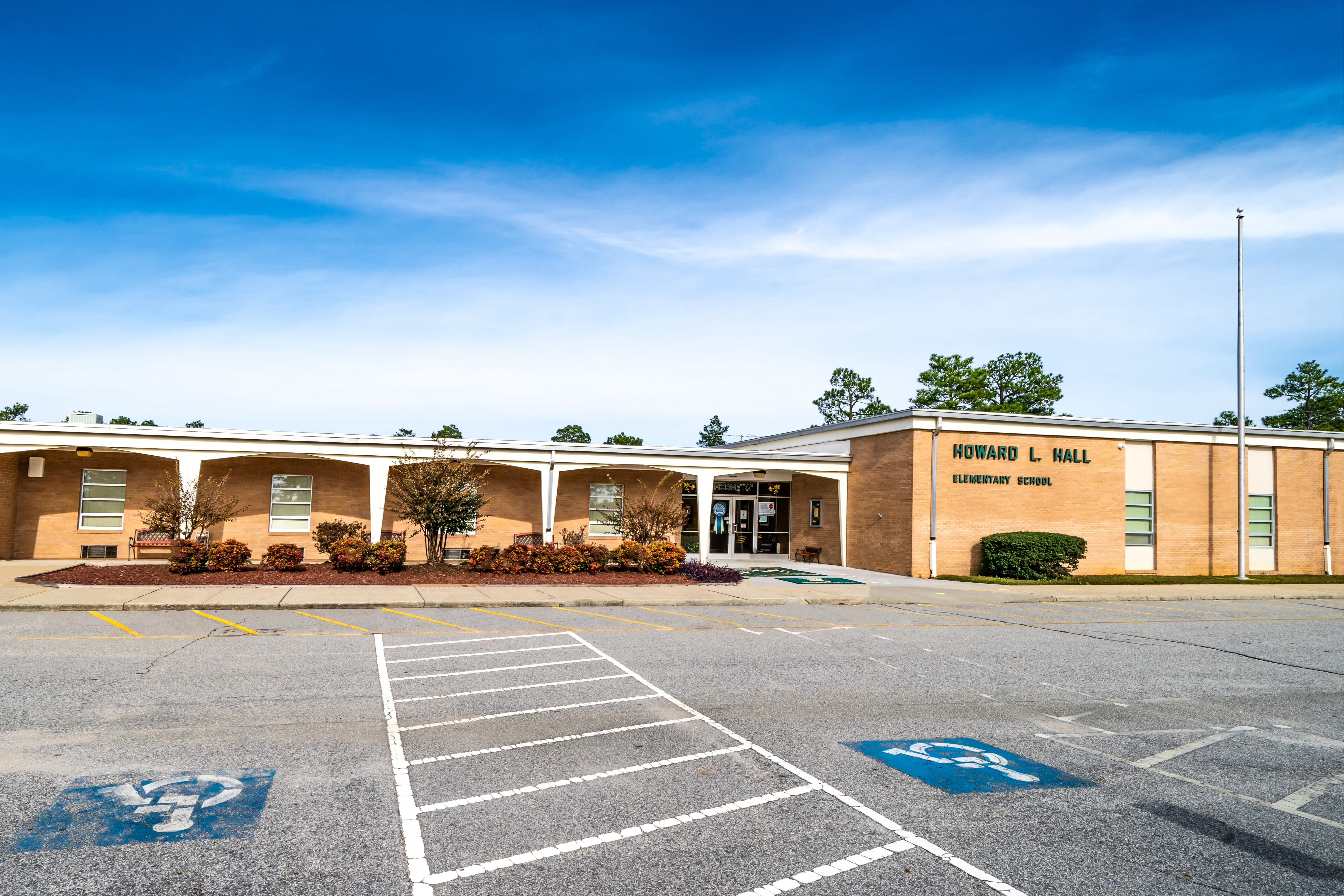 A photo of the front of howard hall elementary