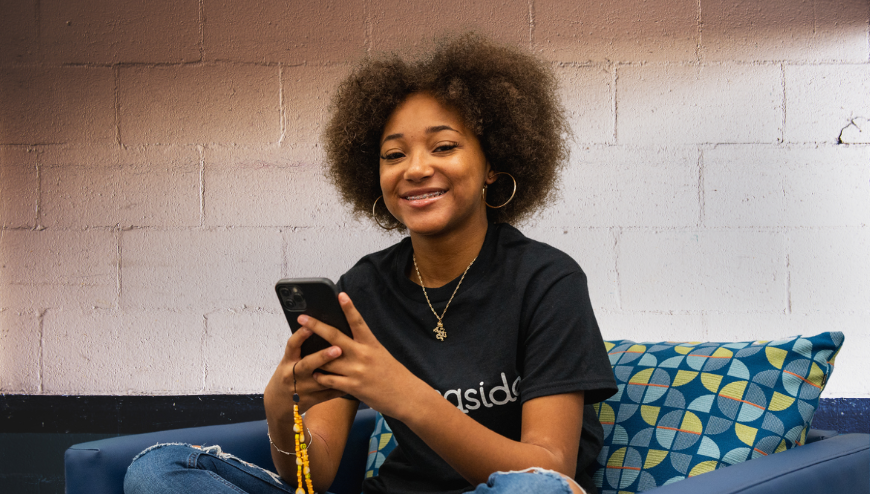 Image of high school student with phone