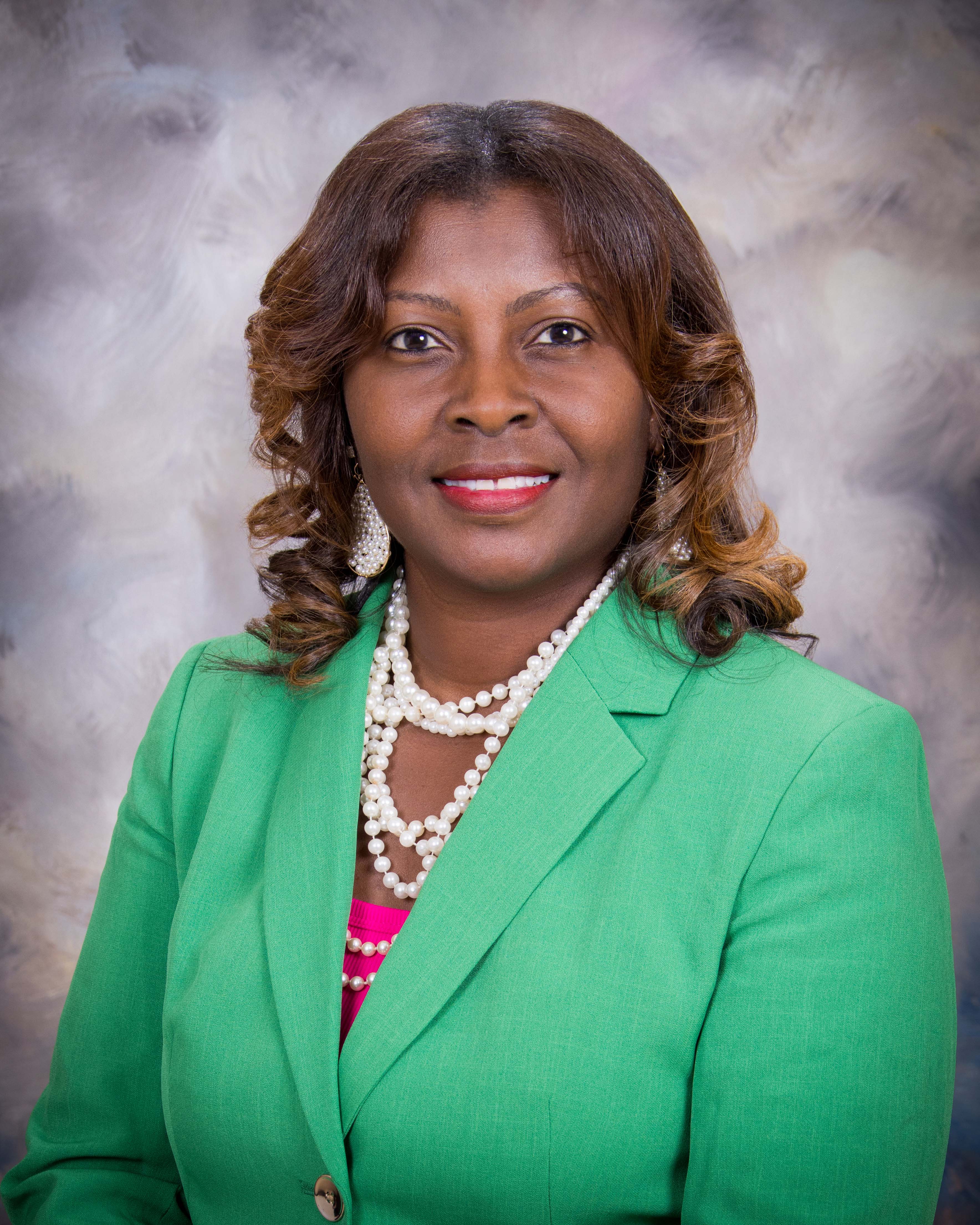 image of lady in green jacket