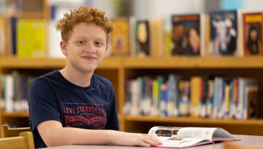 MS student reading a book