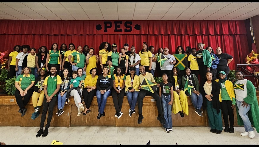 People in Green,yellow and black on a stage