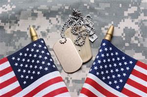 Military dog tags and US flags