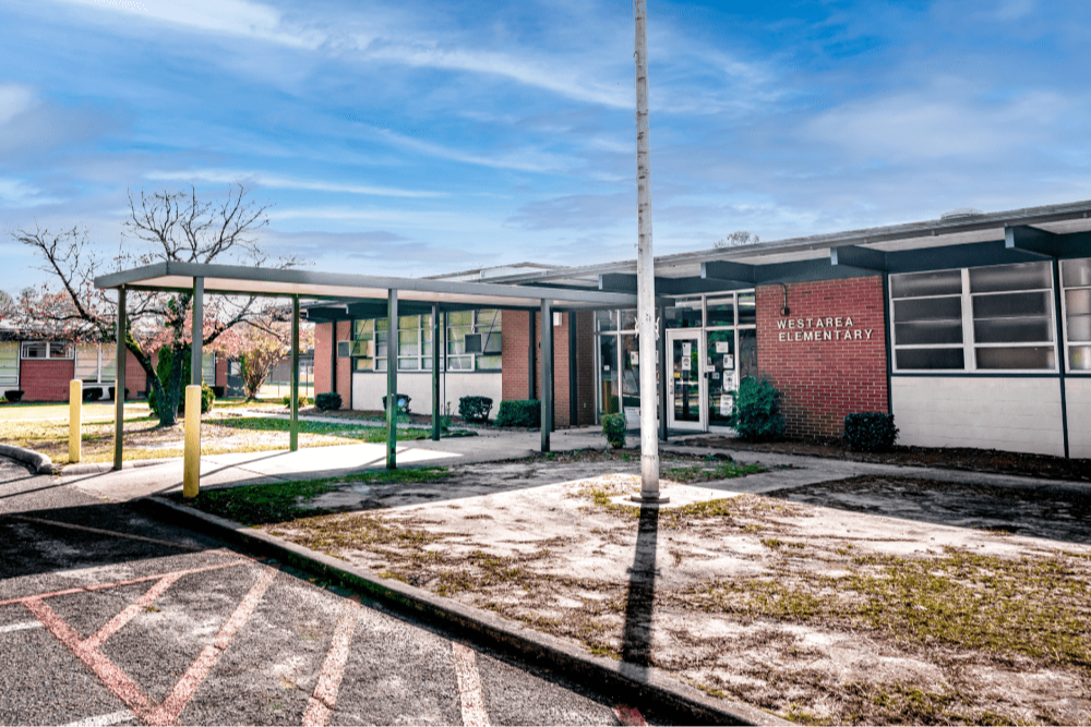 A photo of the front of westarea elementary school