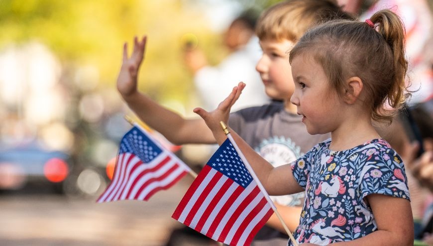 Children waving their hands