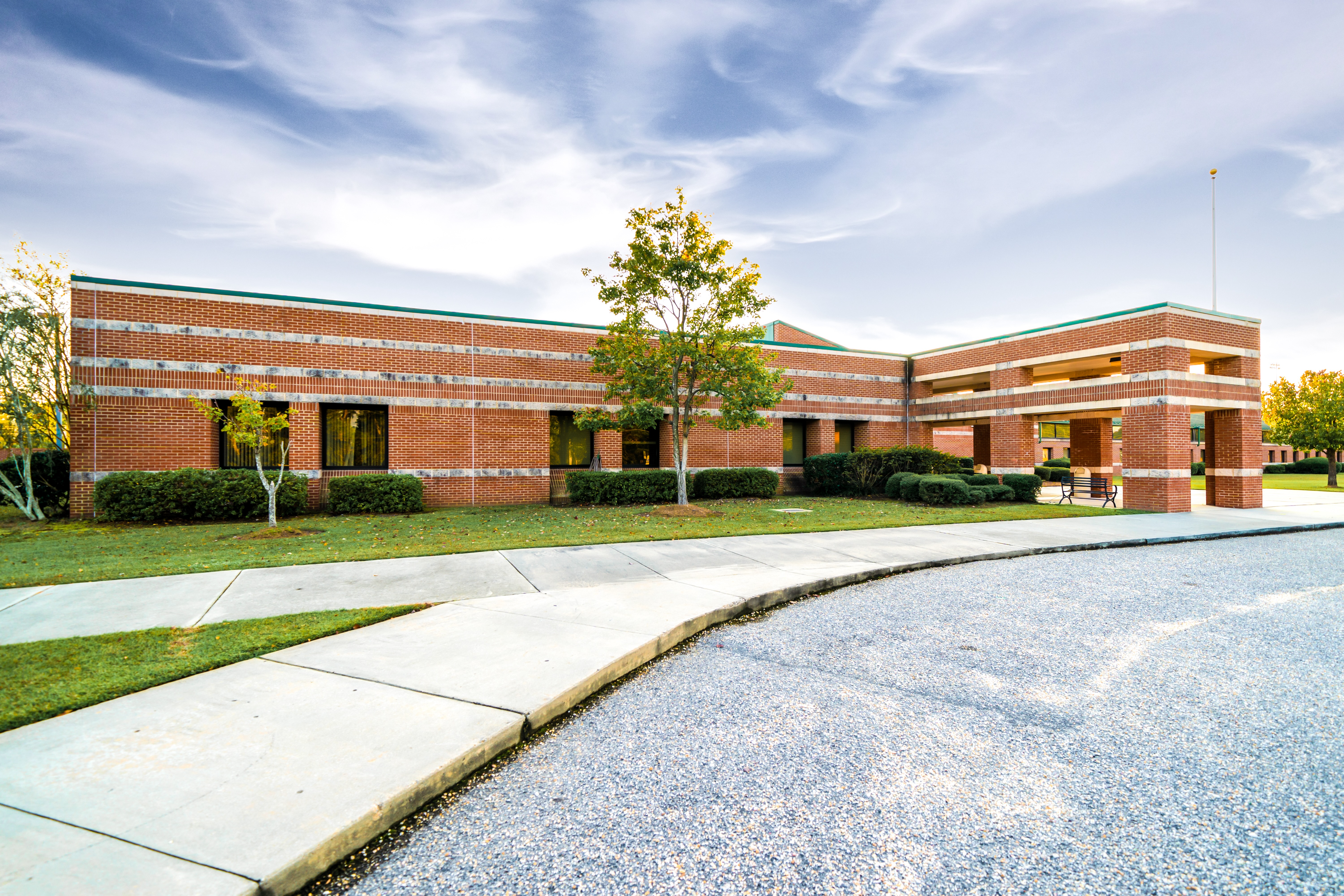 A photo of the front of john griffin middle school