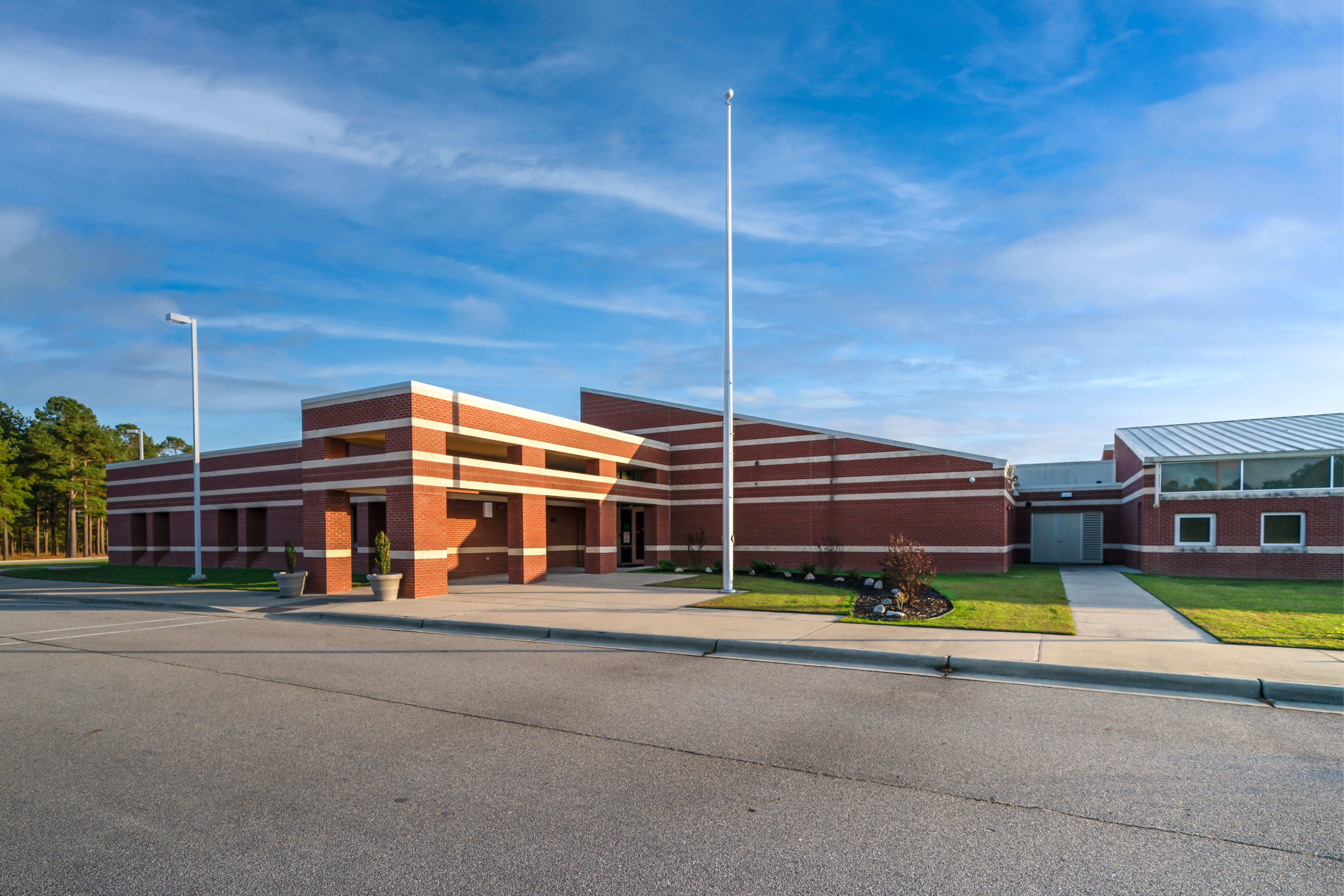 A photo of the front of new century middle