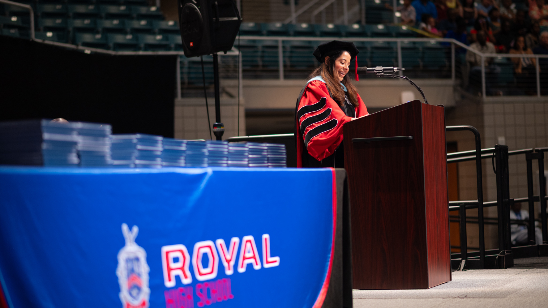 Superintendent gives remarks from the podium during the Royal High School graduation ceremony.