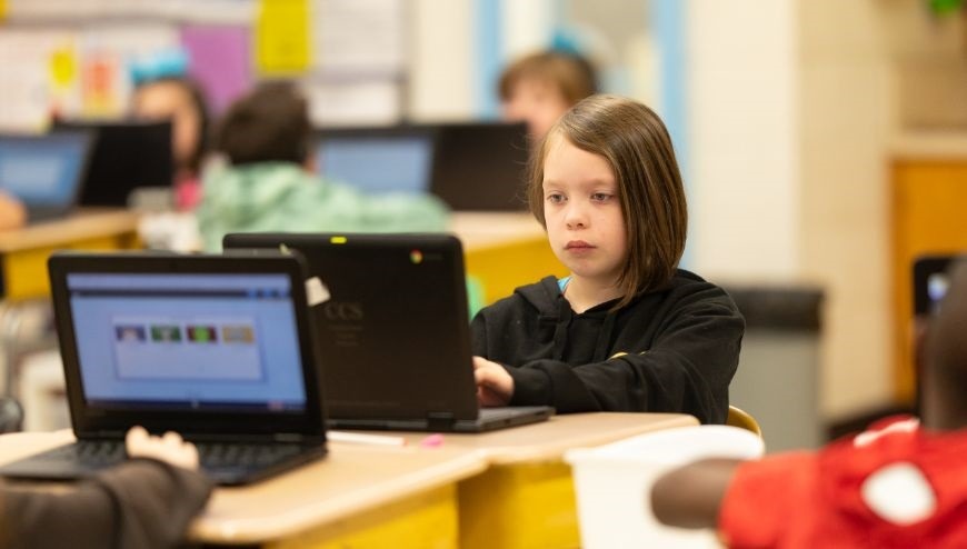 Image of student with laptop