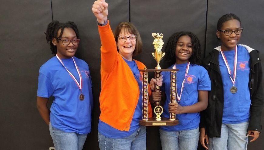 Battle of the Books team with coach 