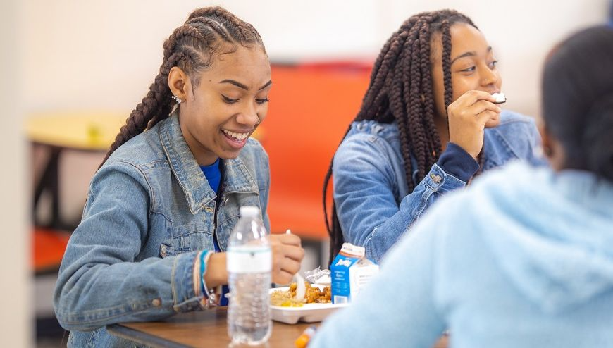 image of students eating in a cafeteria