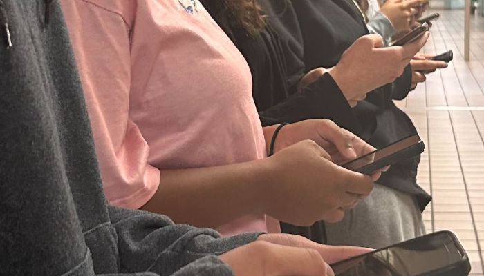 Image of students texting