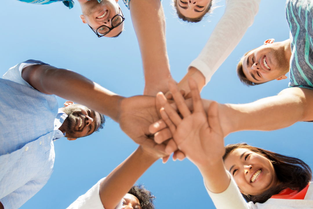 Career and Technical Student Organizations photo of circle of students with hands together