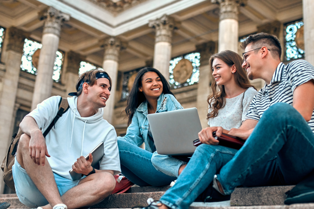 Concurrent Enrollment photo of students sitting on the steps of higher educations