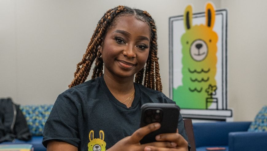 MMG Student with Cell Phone