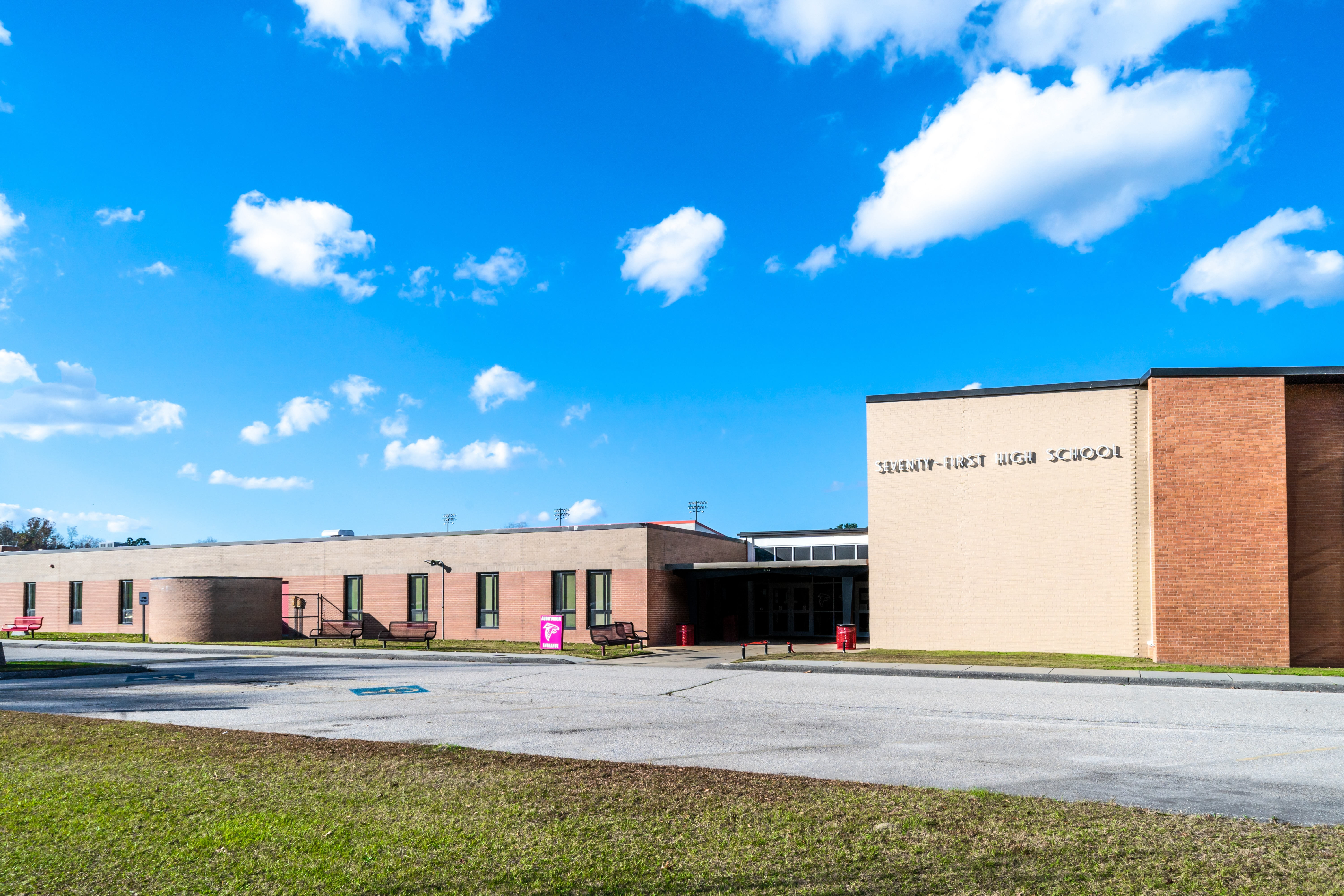 A photo of the front of seventy-first high school