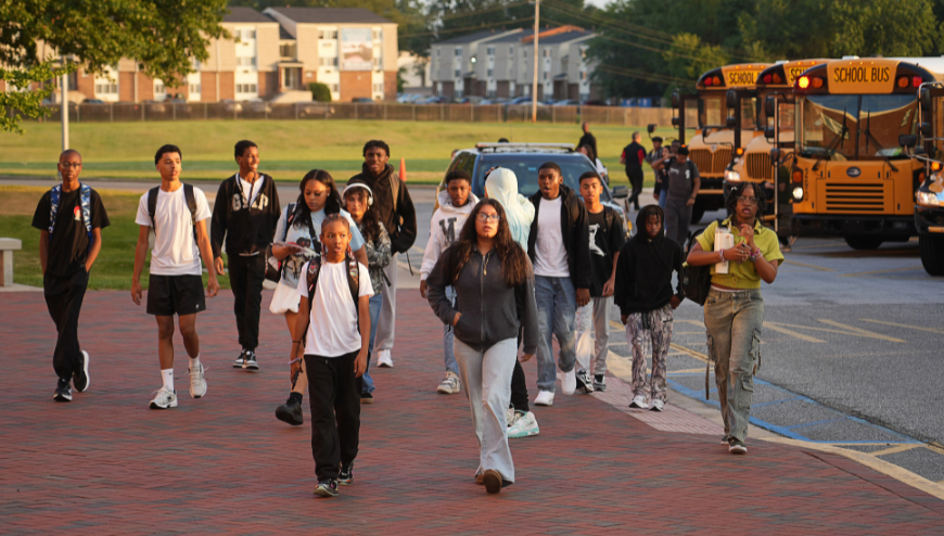 picture of students getting out of school bus