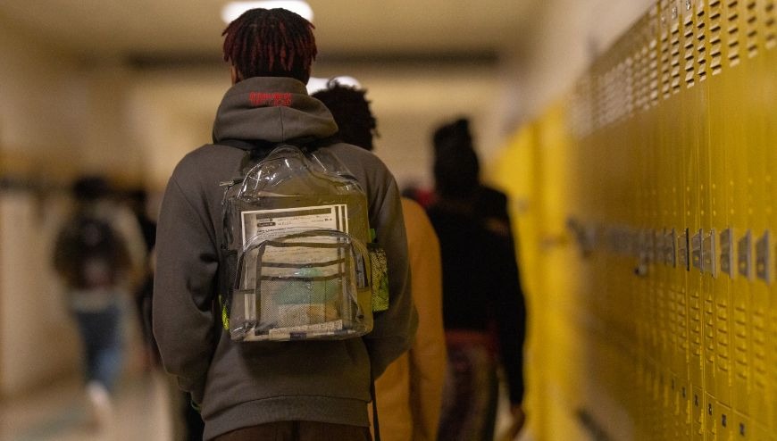 Male student with clear bookbag