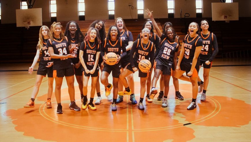Image of a girl's varsity basketball game.