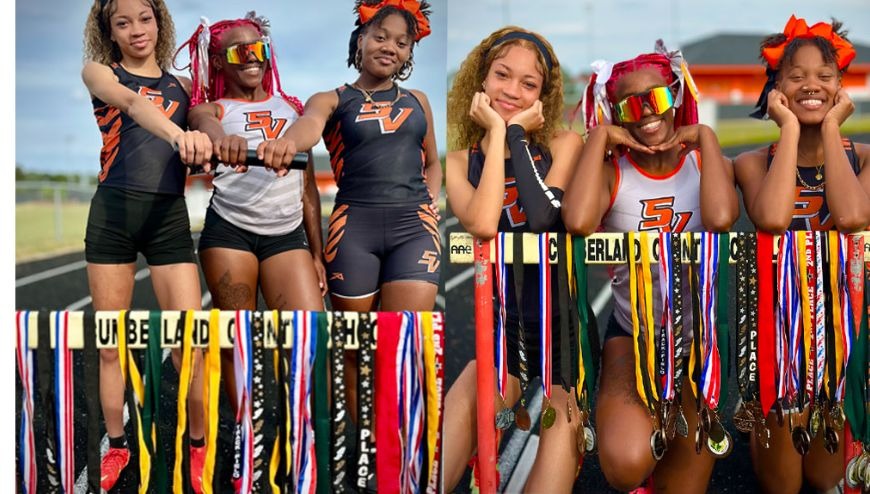 Image of track students with medals