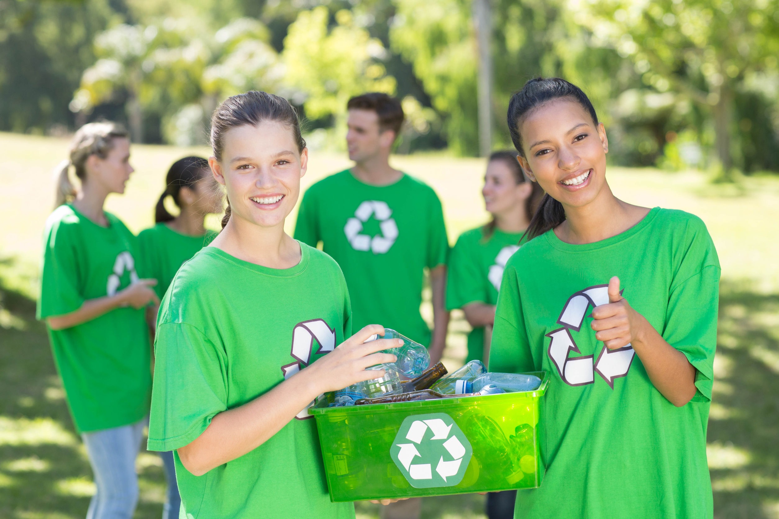 High School Students recycling in the park