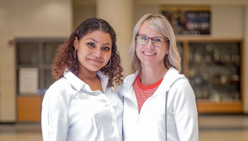 Image of a volunteer with a student