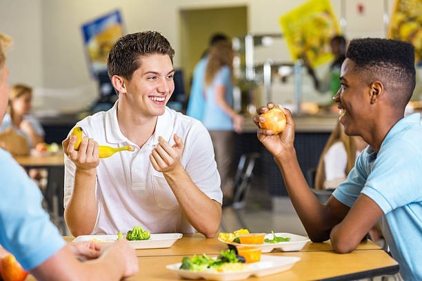 image of students eating in a cafeteria