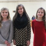  Three girls posing for a photo