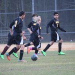 Group of boys playing soccer