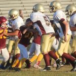  Team of football players on field.