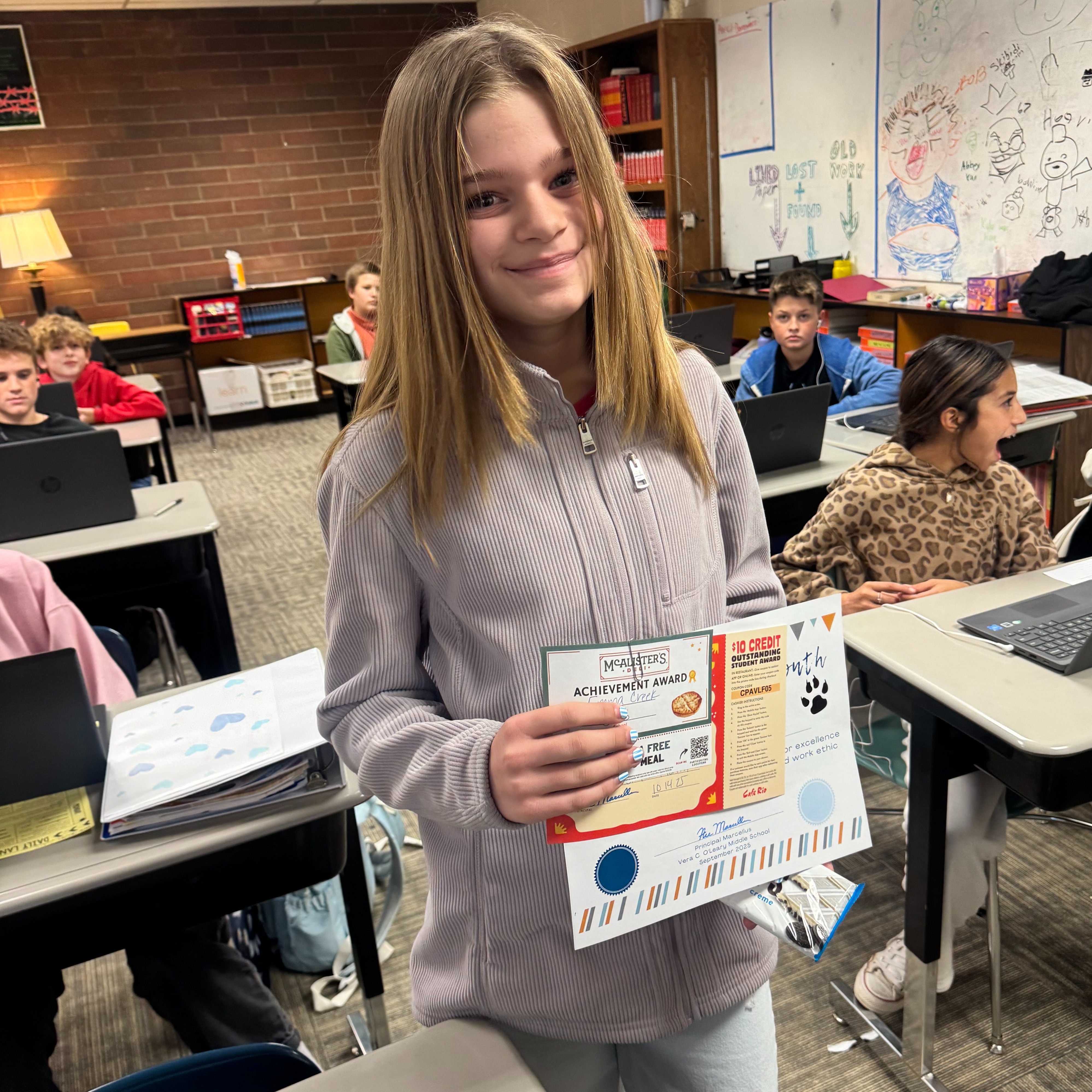 Student of the month with certificate