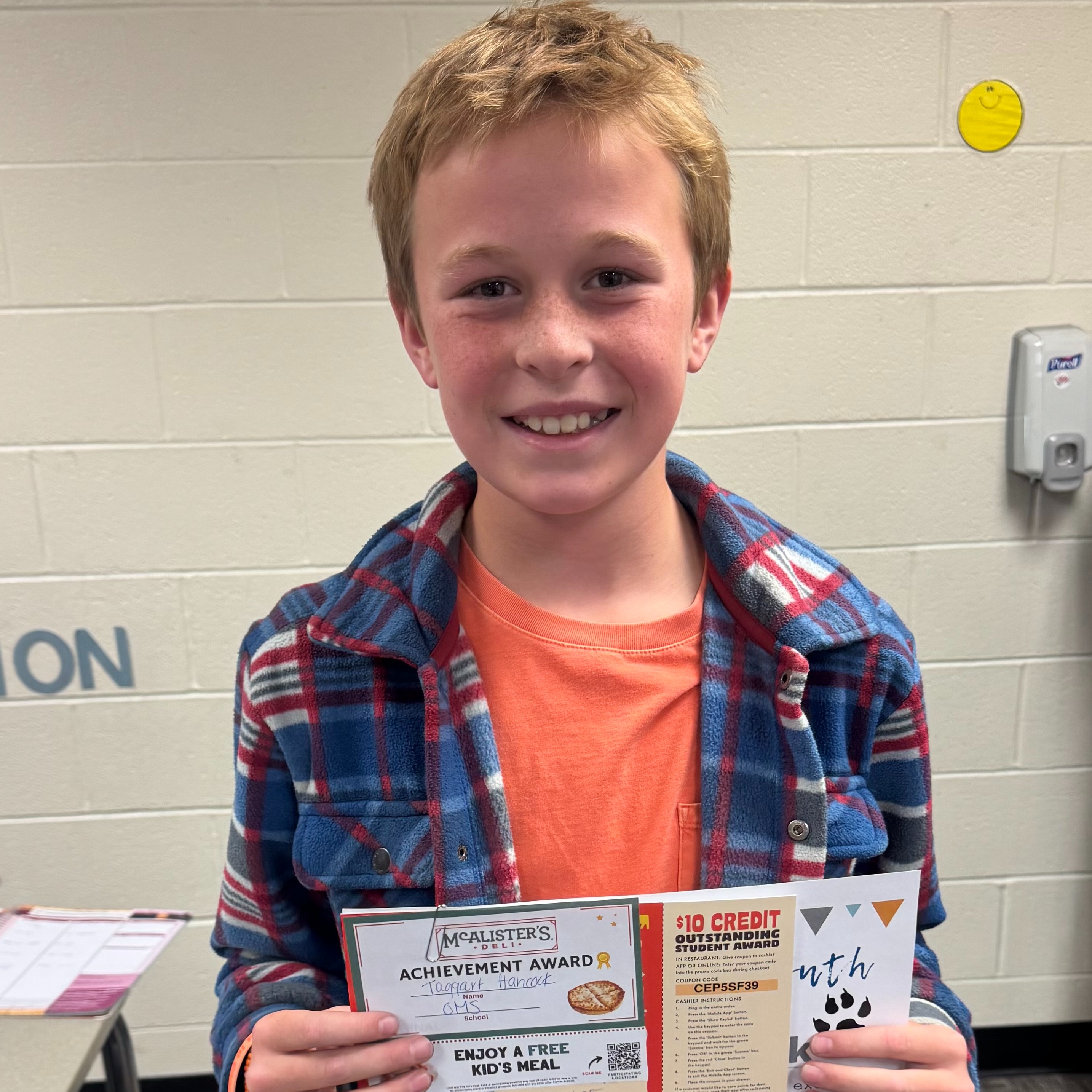 Student of the month with certificate