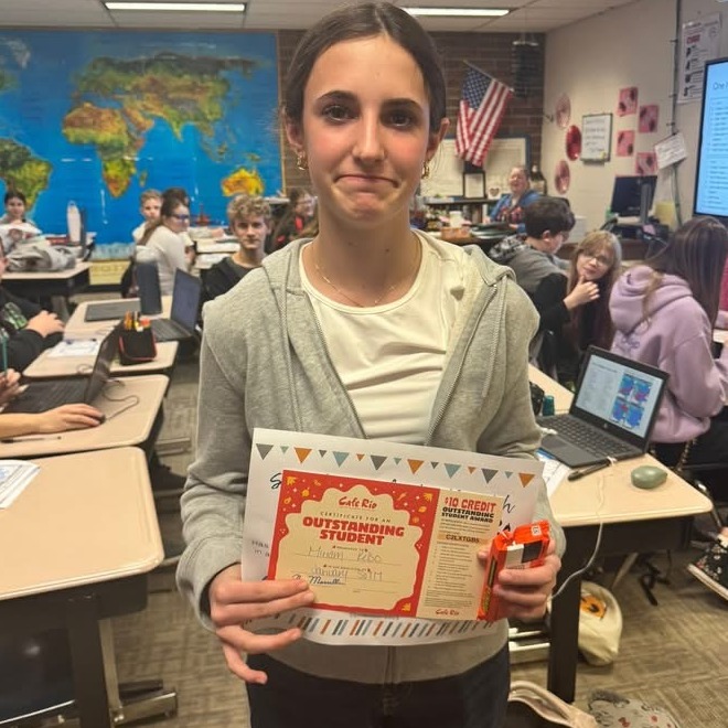 Student of the month with certificate