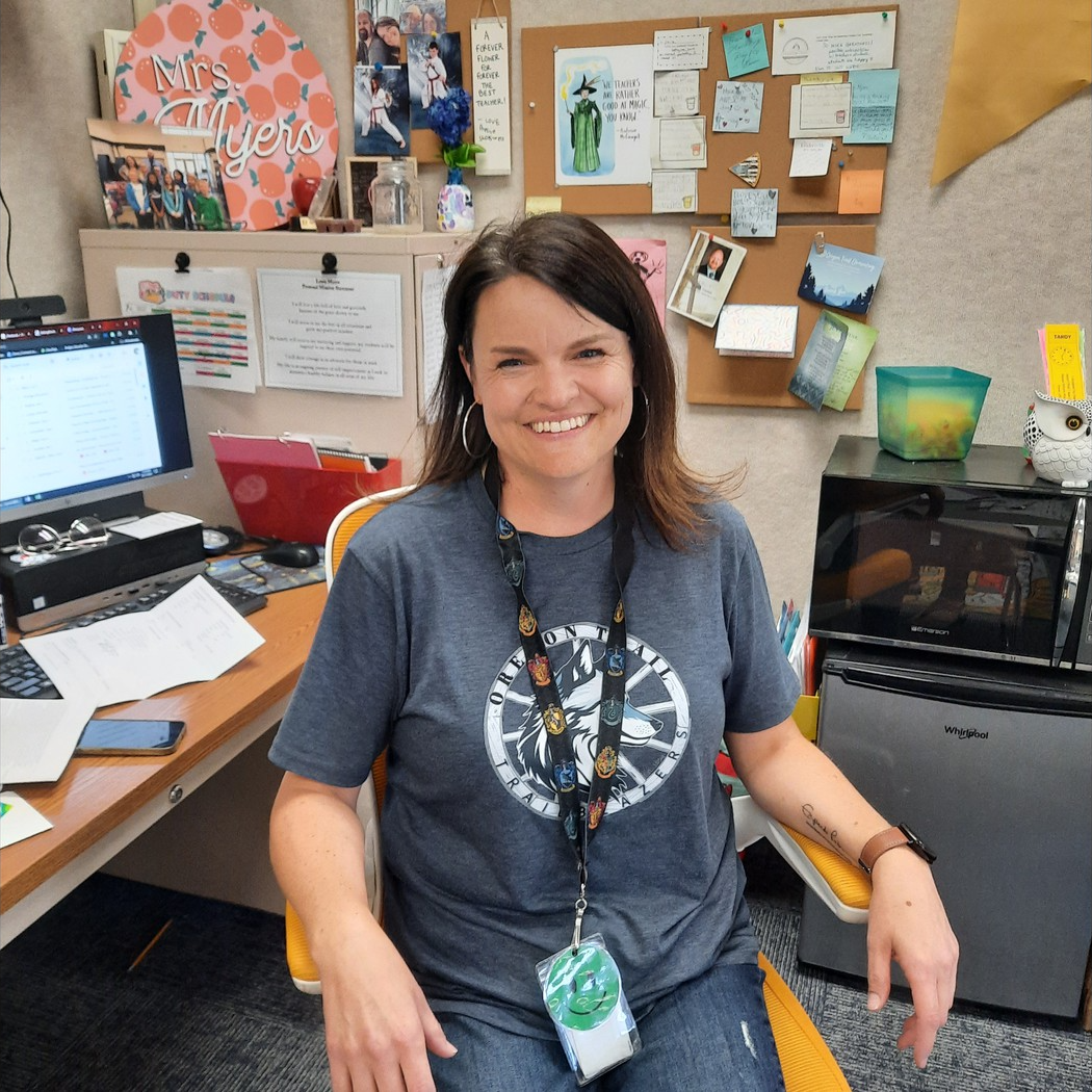 Mrs. Meyers, Second Grade Teacher Smiling for Golden Chair Picture