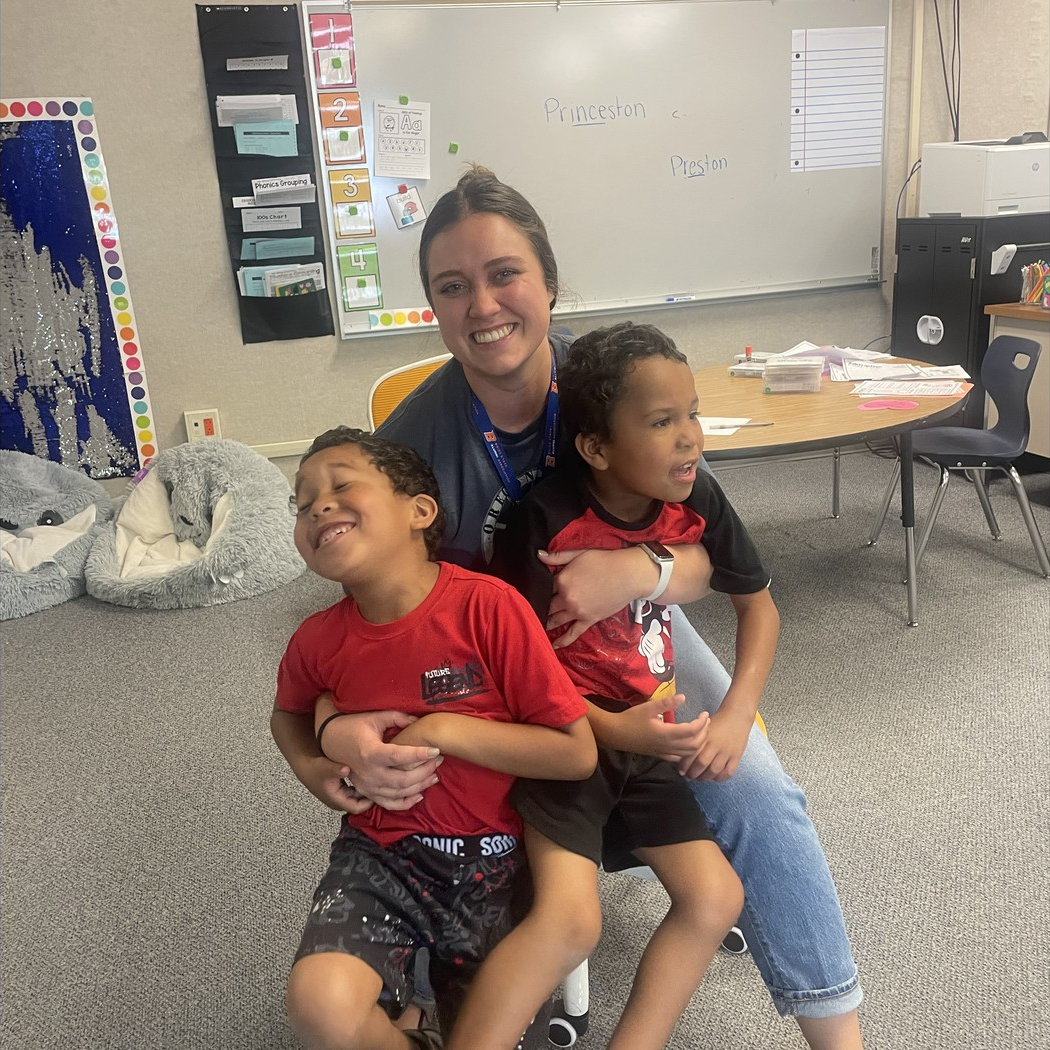 Ms. Oberg, SPED Teacher Smiling for Golden Chair Picture