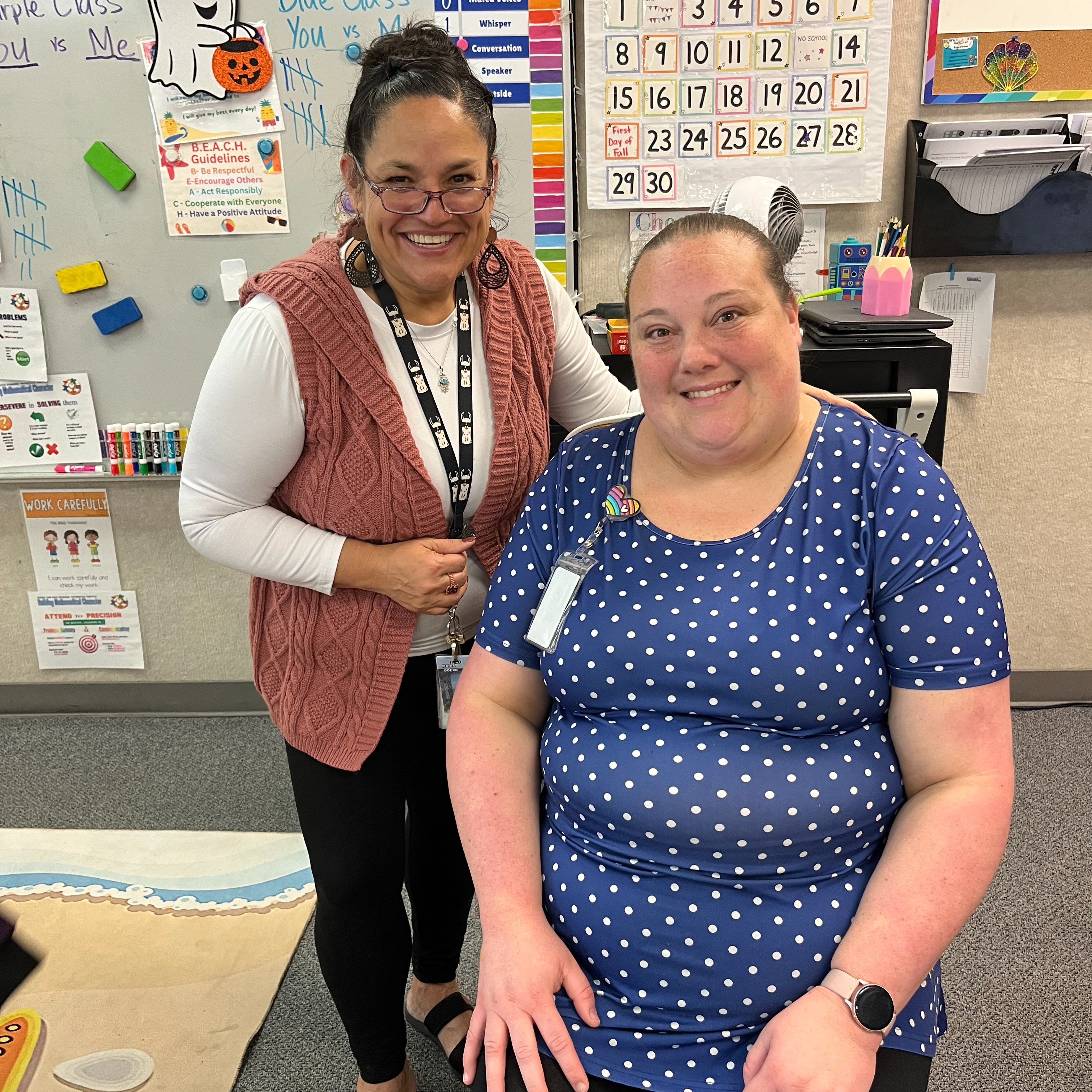 Mrs. Tubbs , Second Grade Teacher Smiling for Golden Chair Picture