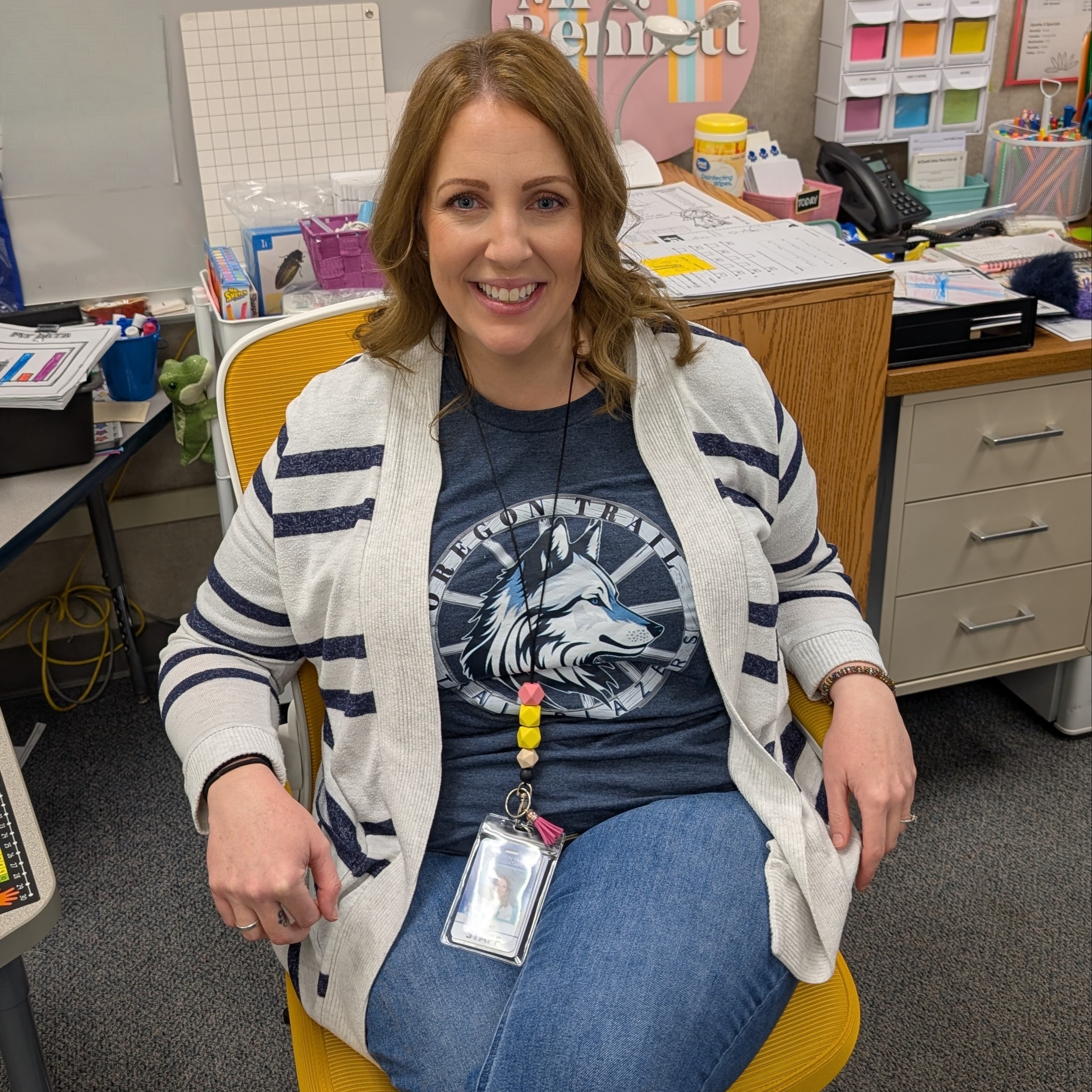 Teacher posing in Golden Chair