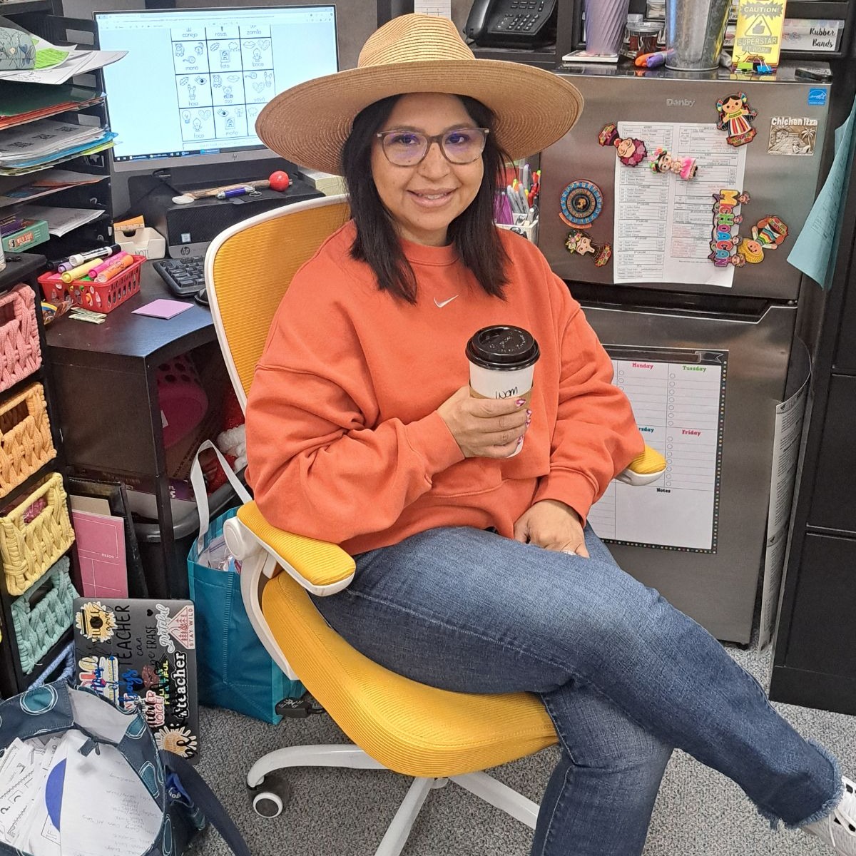 Teacher posing in Golden Chair