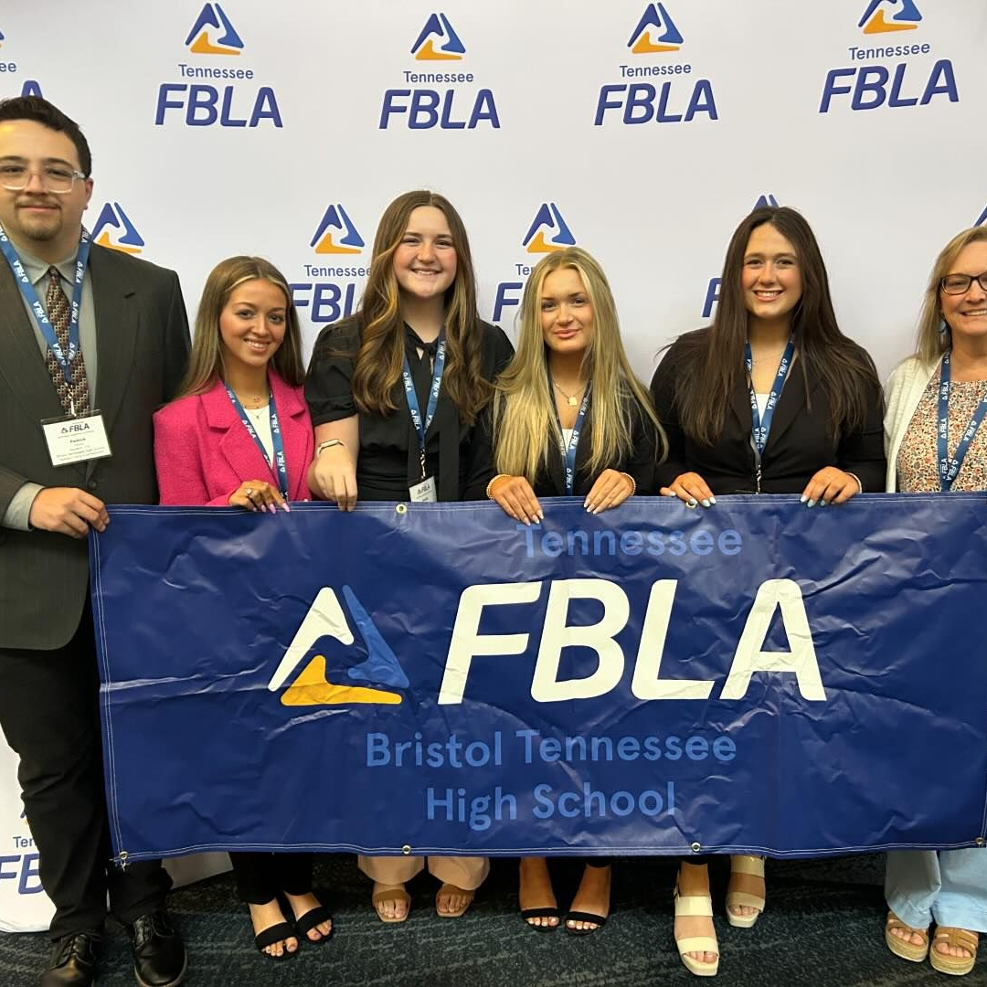 Photo of five high school students and one teacher holding a Future Business Leaders of America  Bristol Tennessee High School banner.