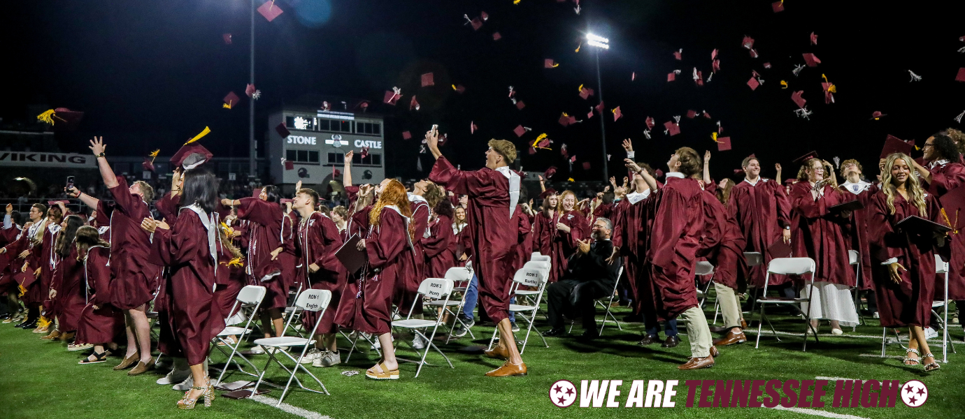 Tennessee High School Graduates Celebrate Throwing Hats with "We Are Tennessee High" graphic