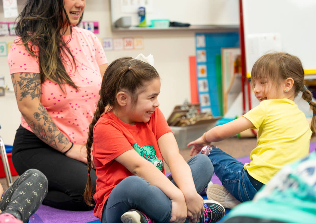 Teacher with students