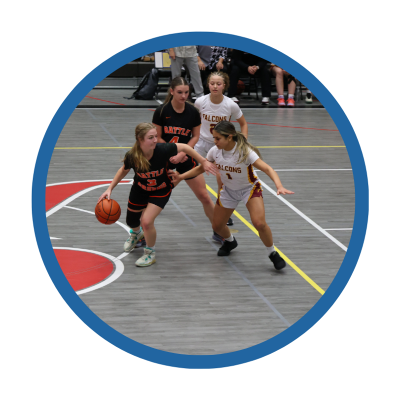 Students play a basketball game
