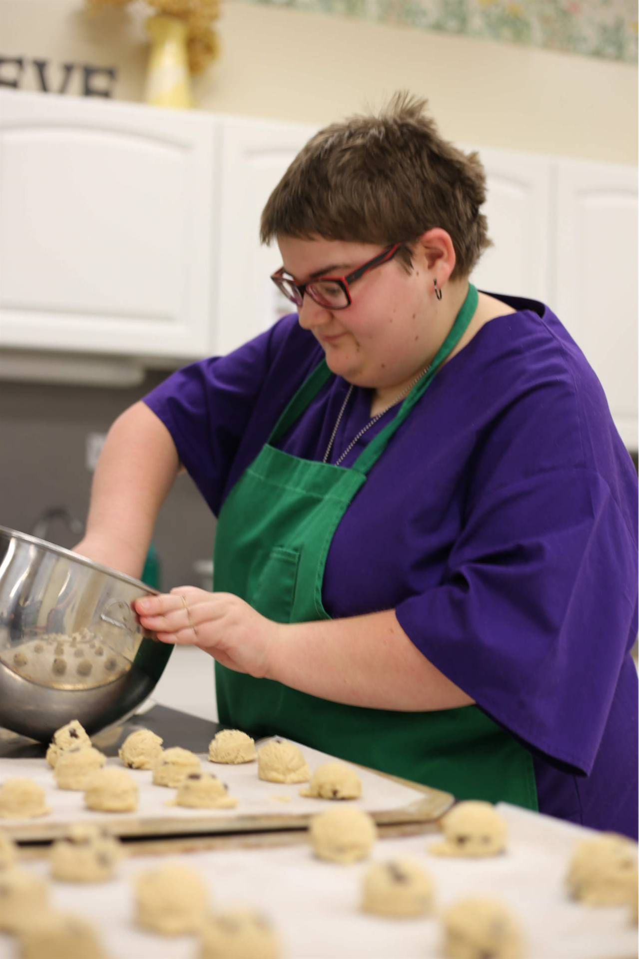 girl cooking cookies dough