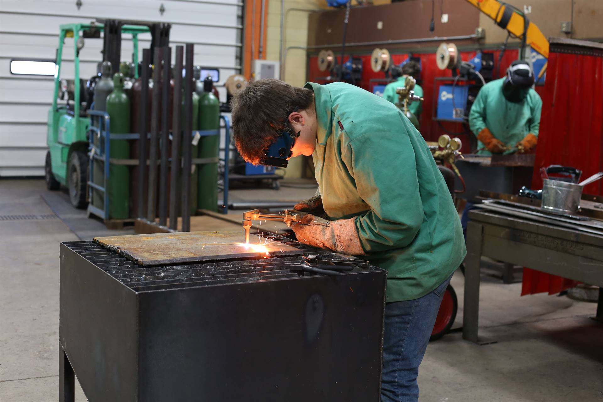 guy wearing a mask welding