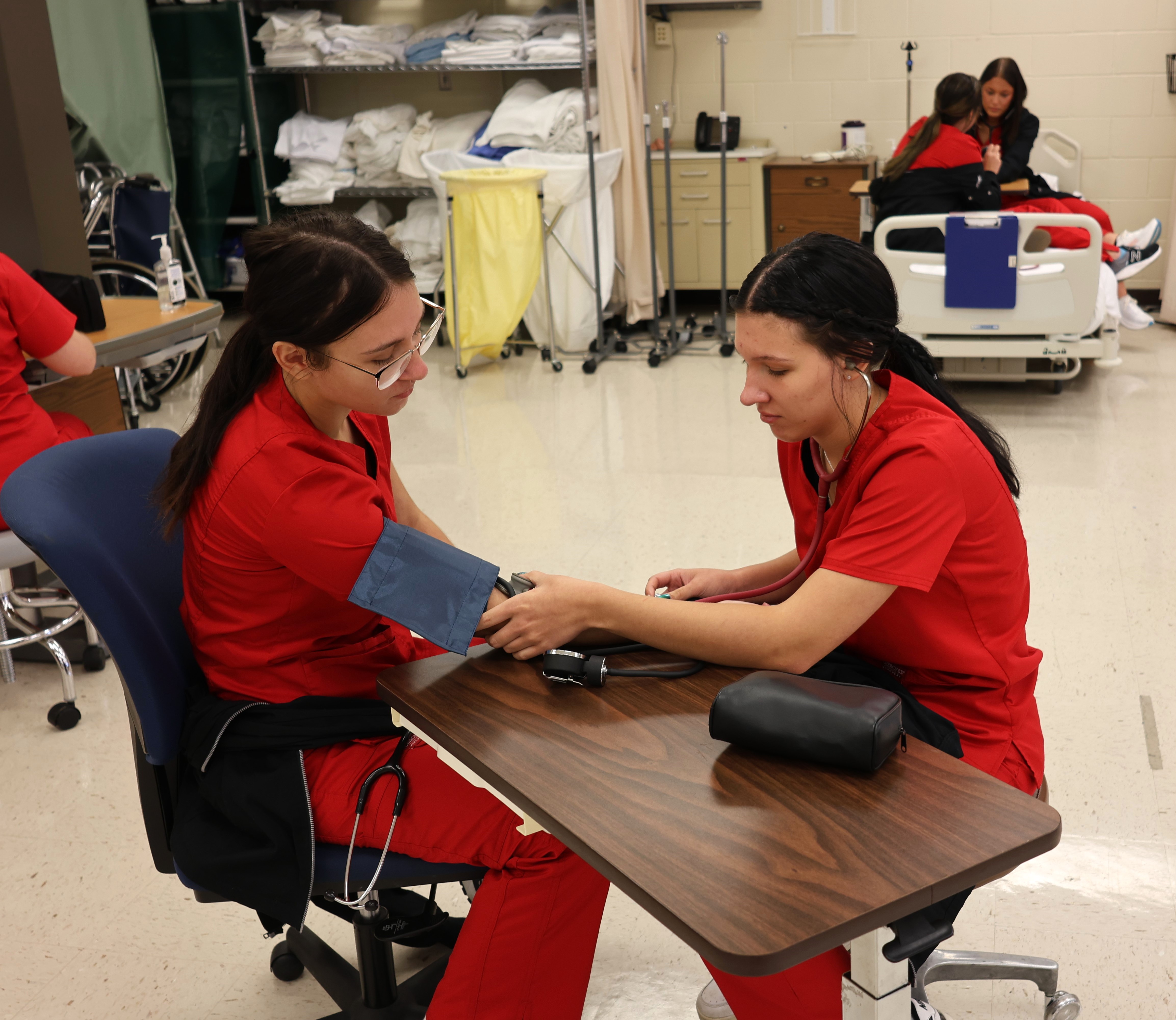 Intro to nursing students reviewing 