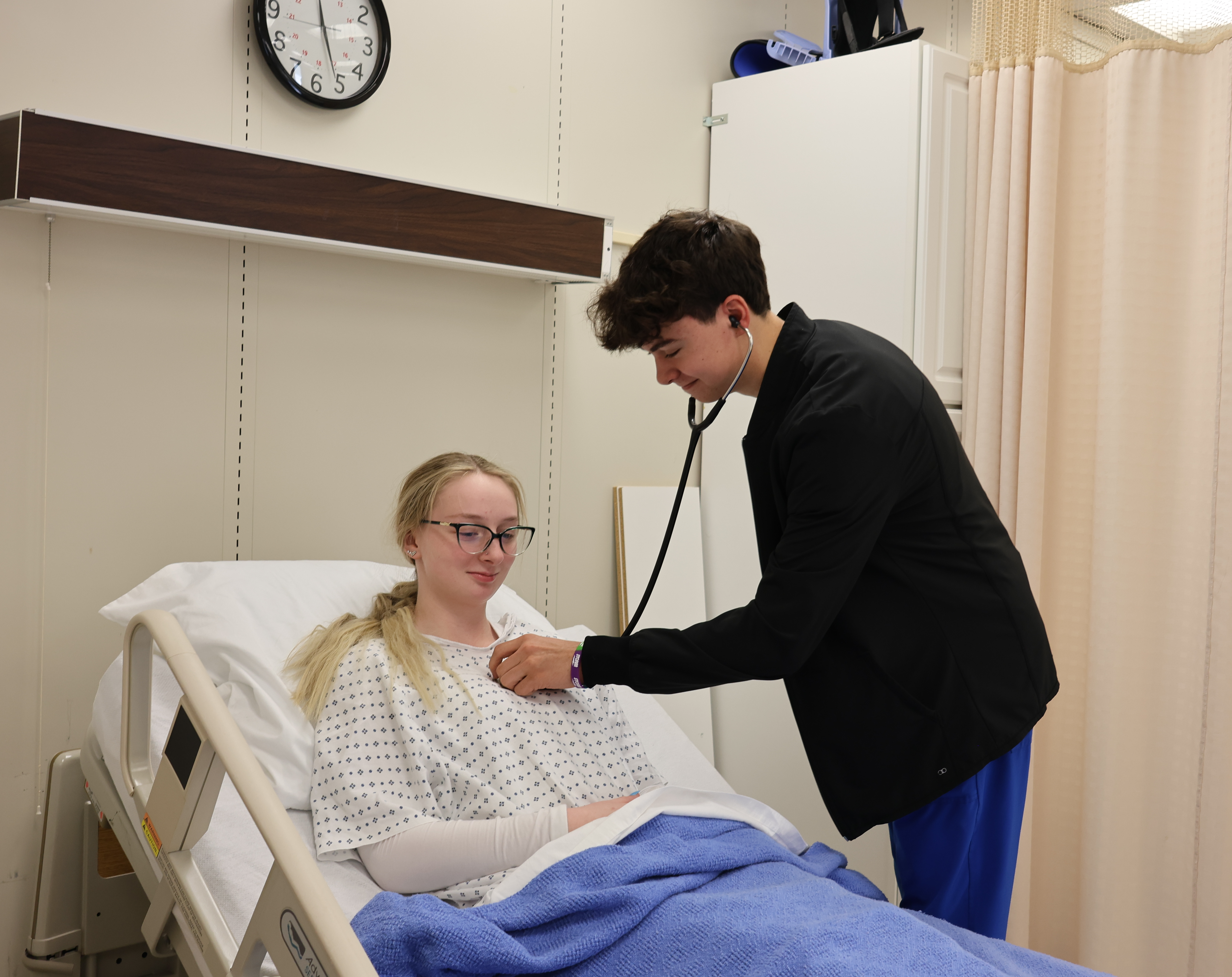 Intro to nursing students reviewing 