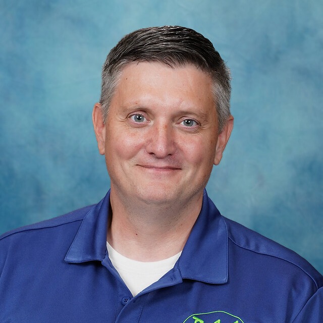 Mr. Tim Vandeborne, Project Lead the Way, brick wall on the background