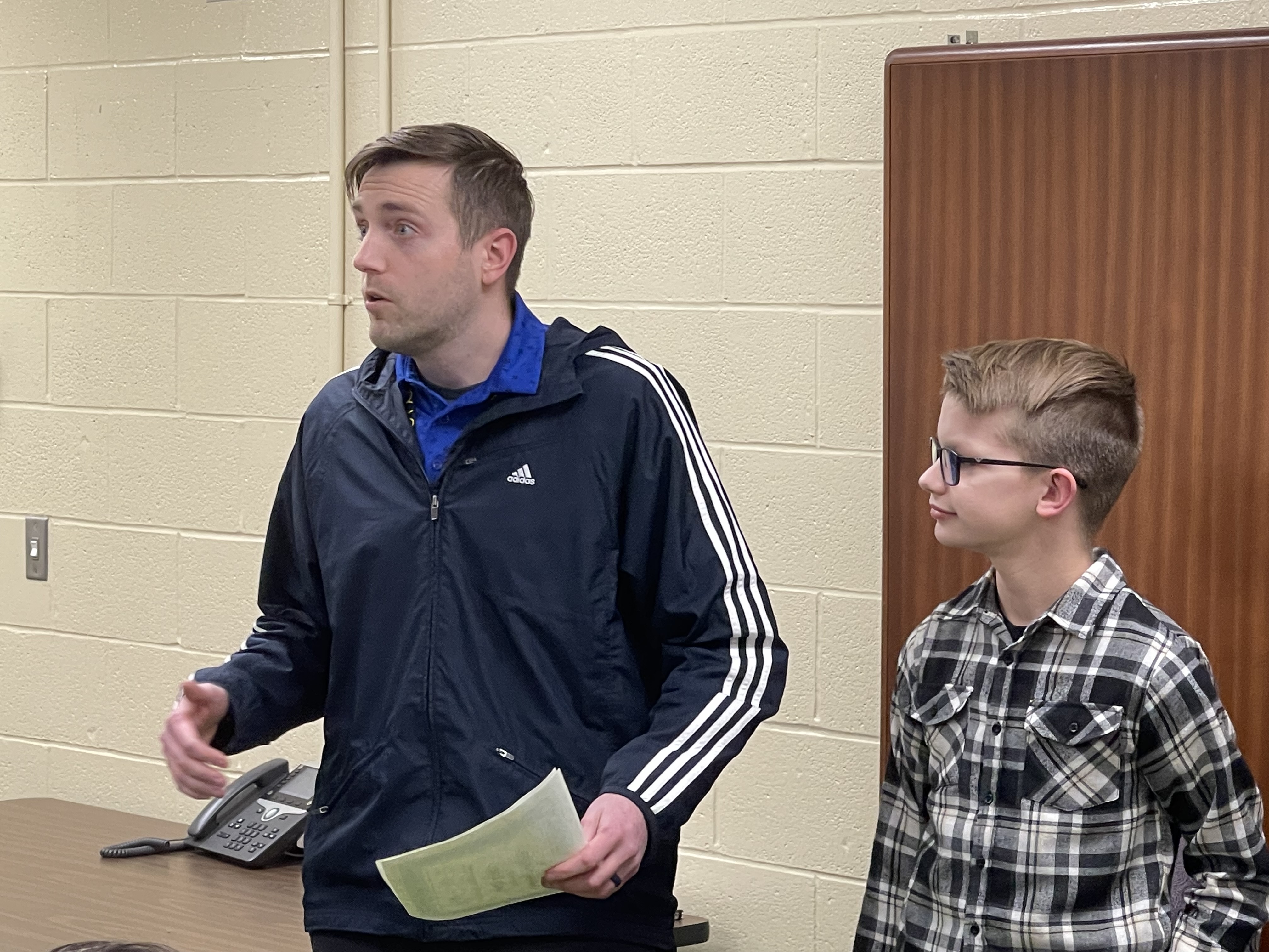 Student and Teacher at Board Meeting