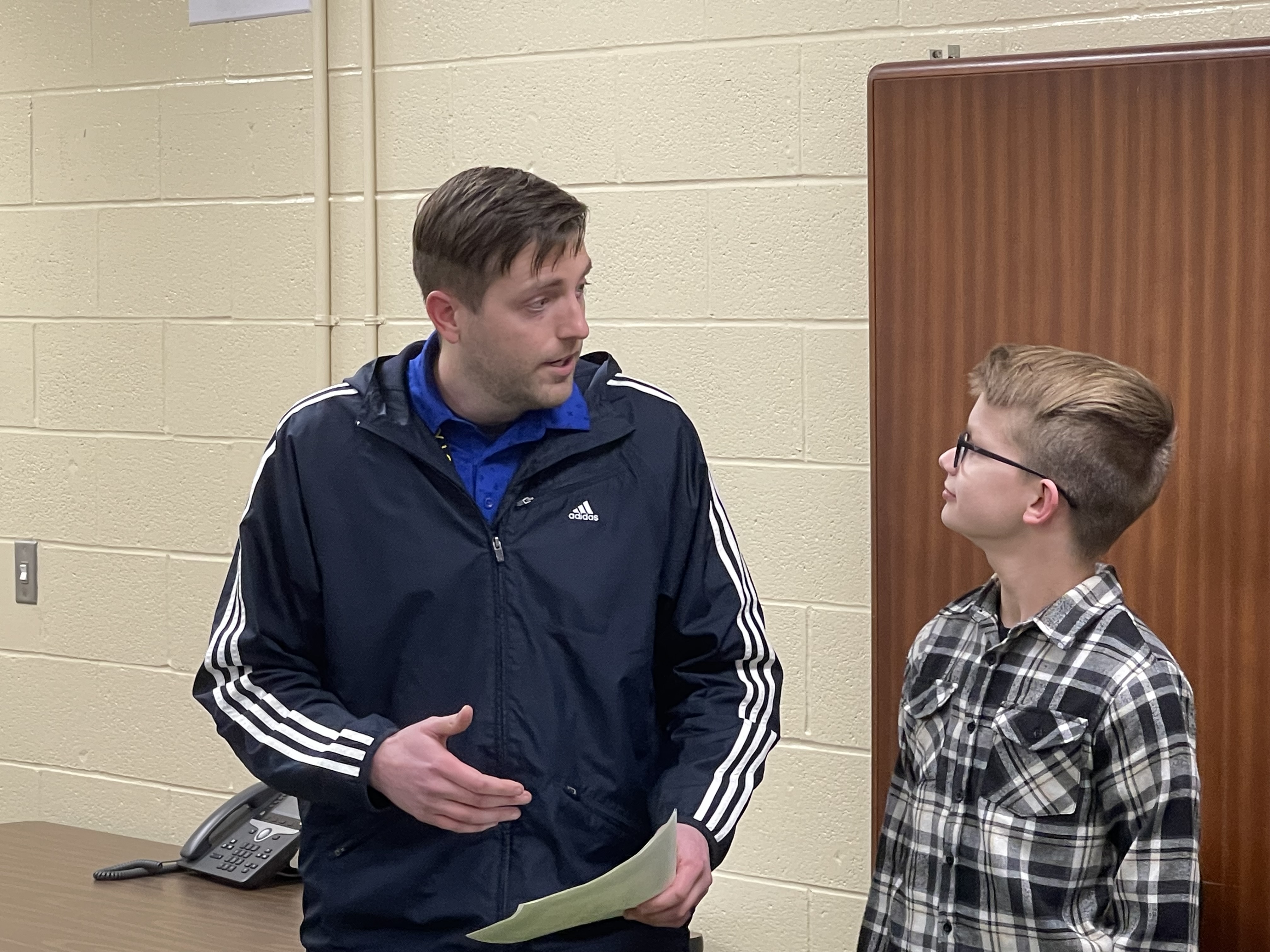 Student and Teacher at Board Meeting