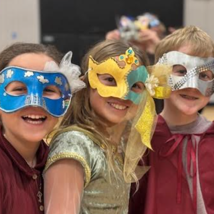Students wearing Renaissance style masks