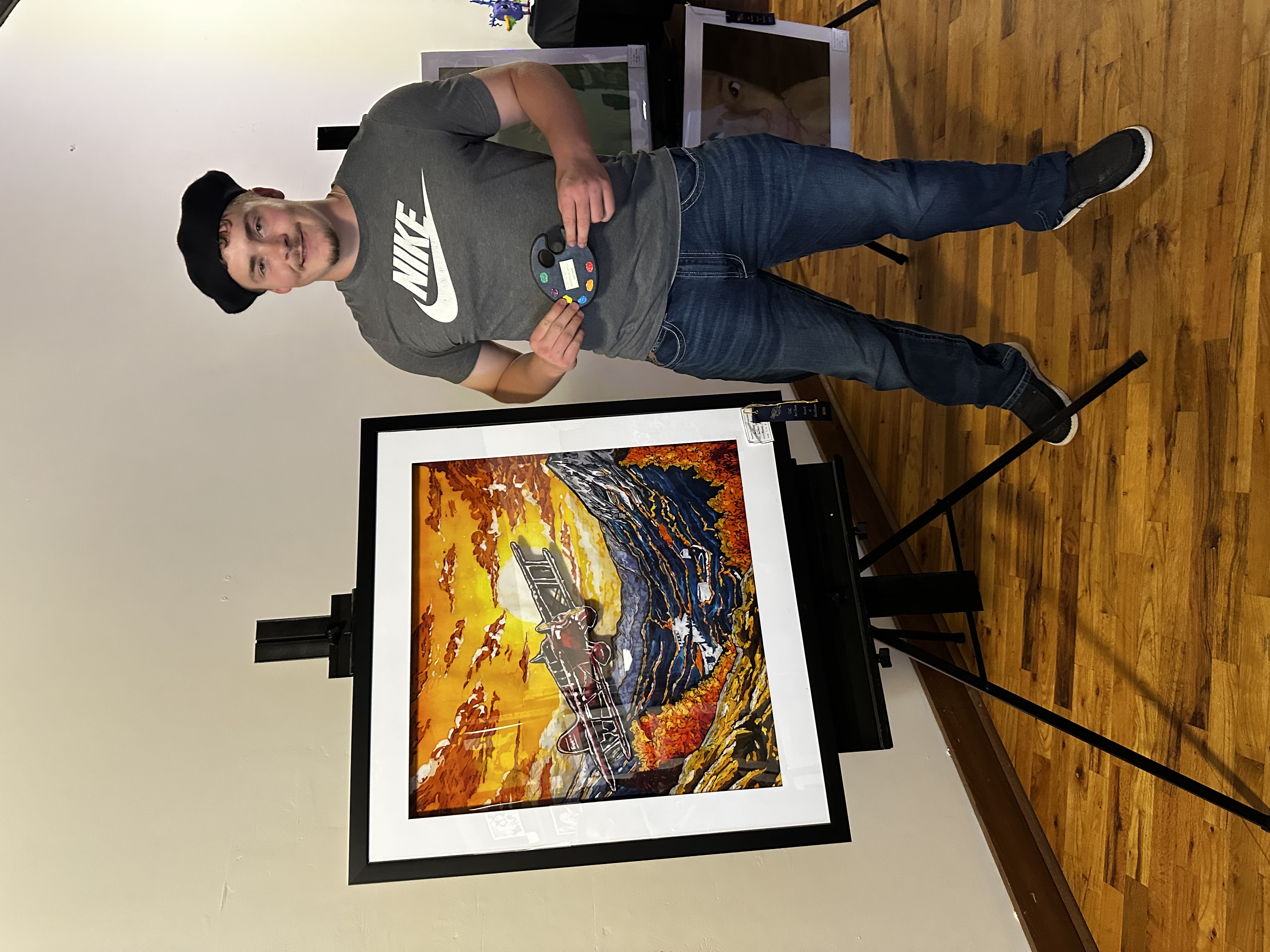 Xanthier Brenn with his best of show artwork